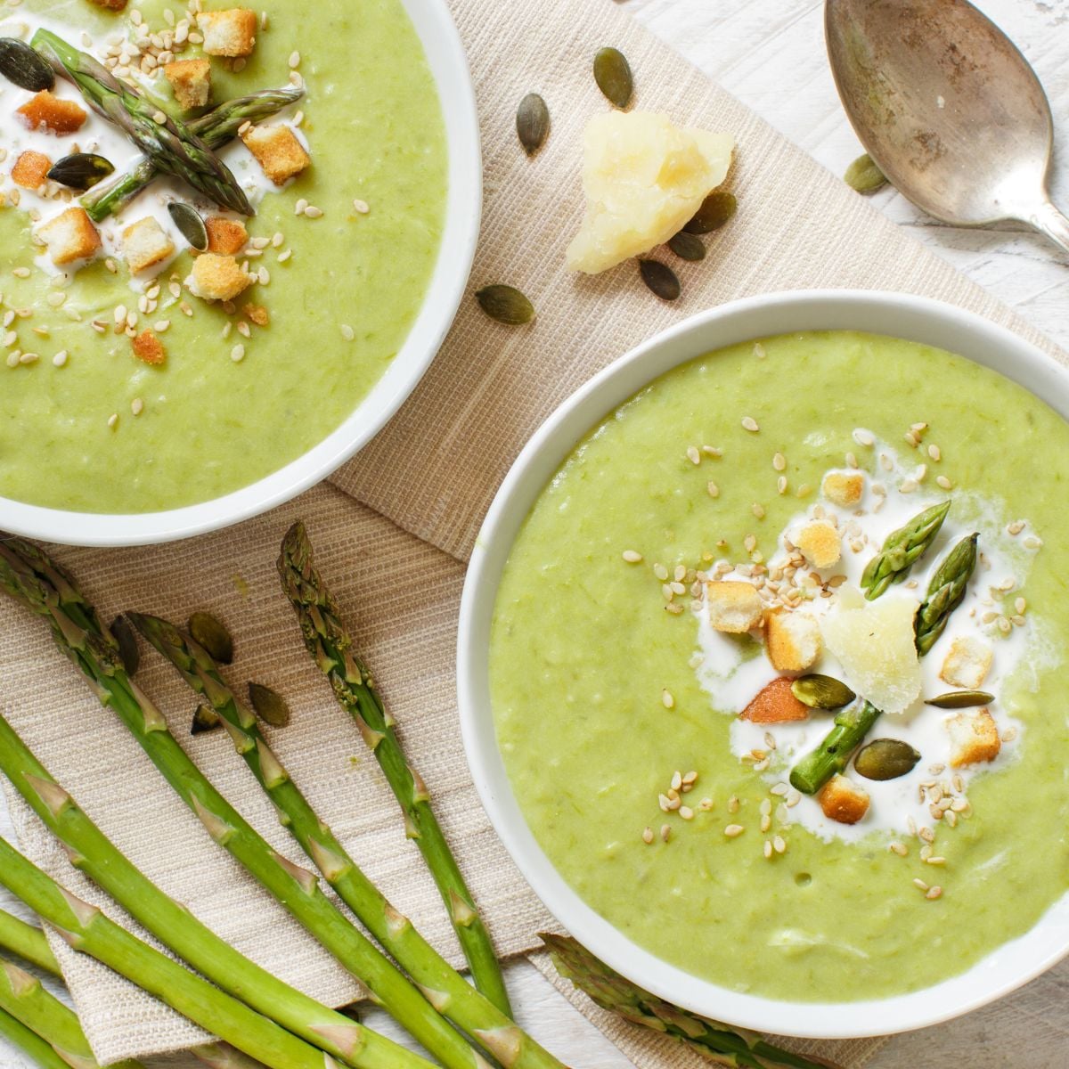 A couple of bowls of creamy asparagus soup. 
