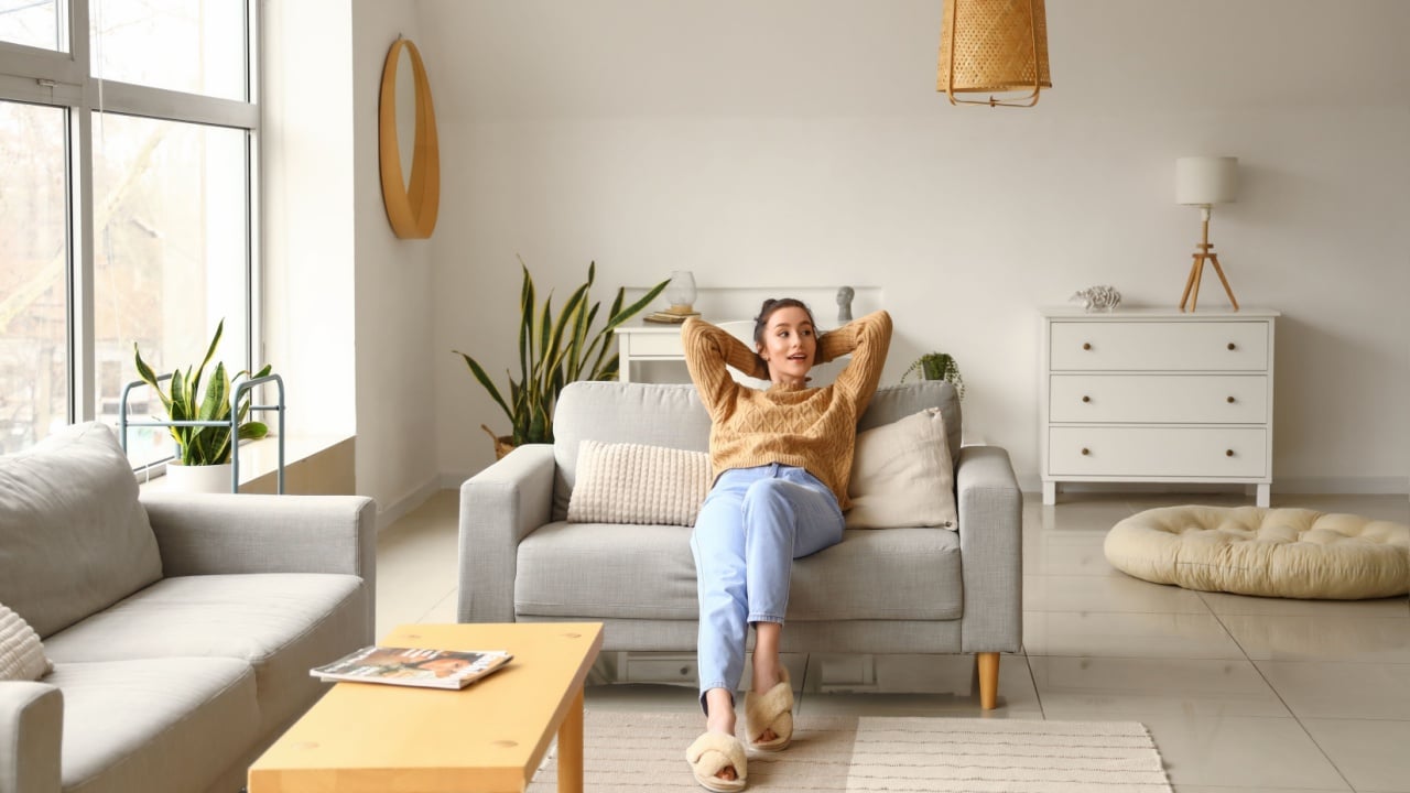 Pretty young woman relaxing at home
