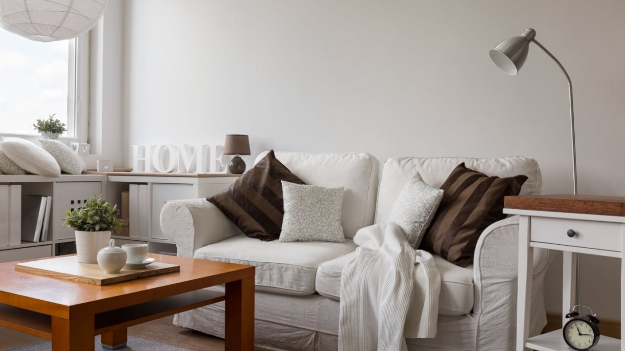 Small cozy living room in white flat