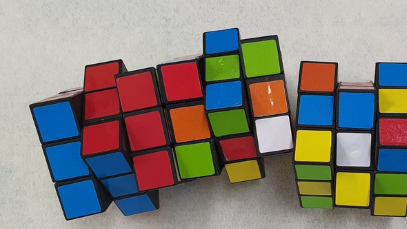 Two Rubik Cubes Joined Together