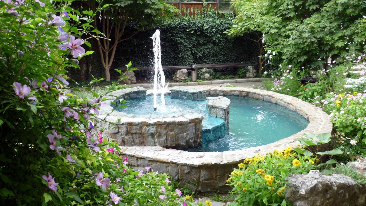 The fountain in the garden of the mountain village