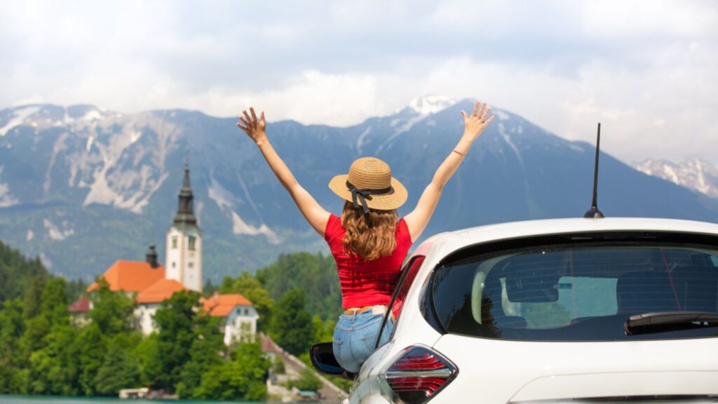 woman traveling tourist slovenia roadtrip lake bled