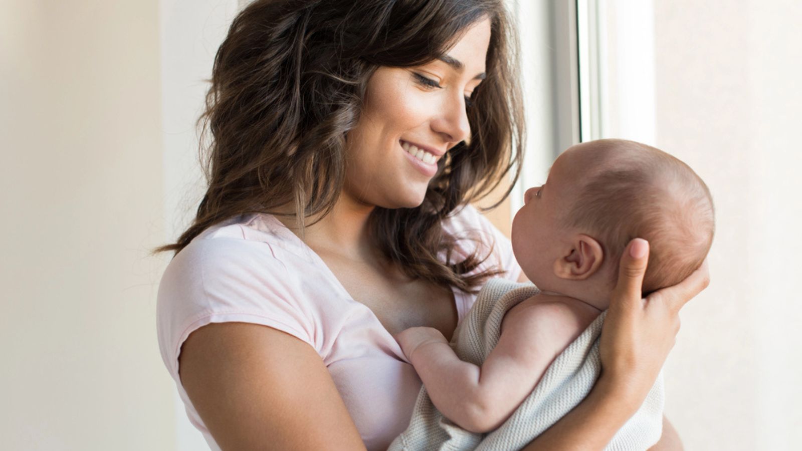 Woman with newborn baby
